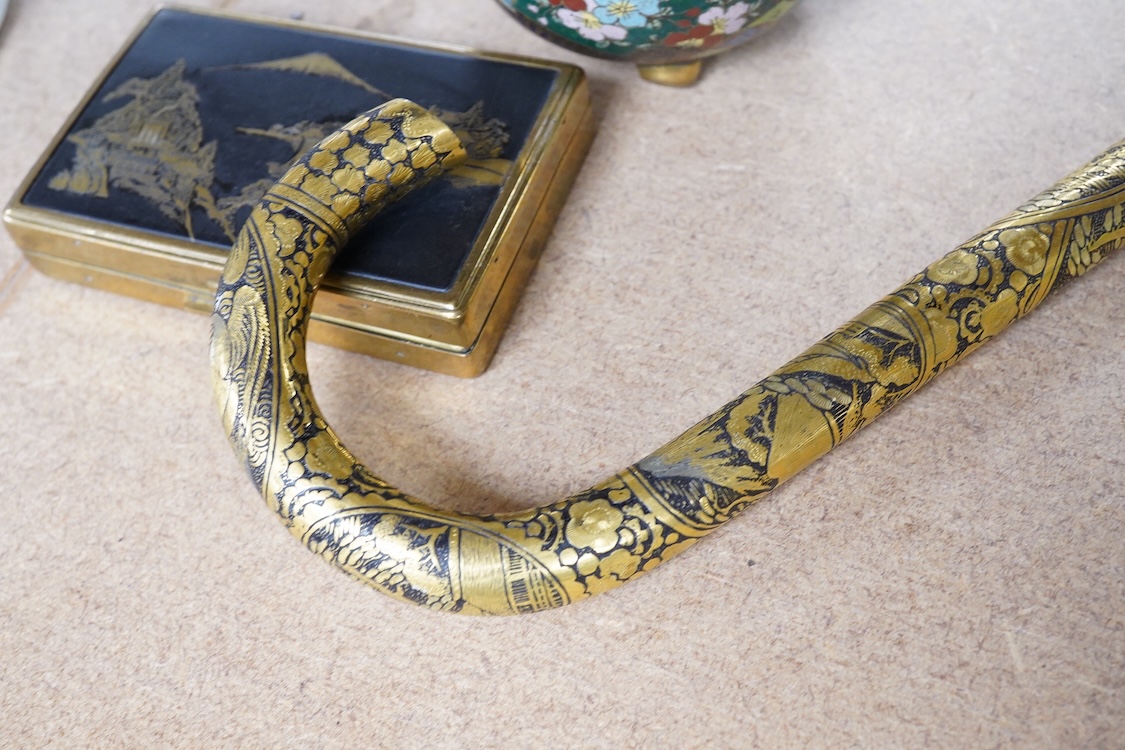 A Japanese damascened iron parasol handle, a cloisonné enamel koro and Komai style mirrored musical compact, largest 24cm in length
